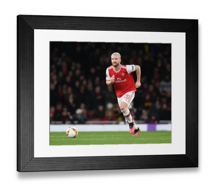 Framed Print : Arsenal vs Olympiacos: Europa League Clash at Emirates Stadium