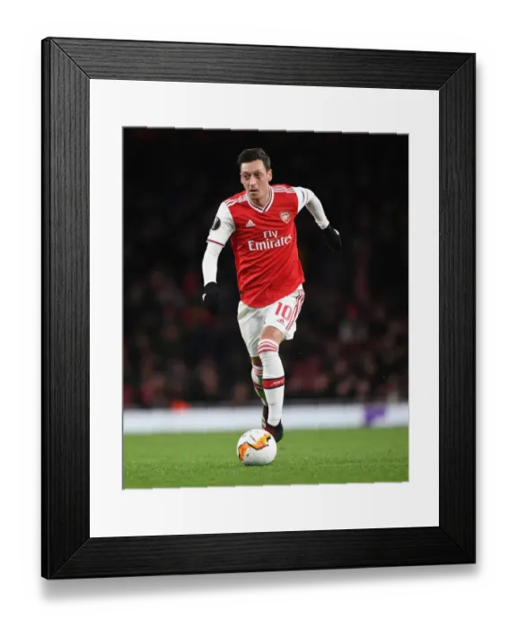Framed Print : Mesut Ozil in Action: Arsenal vs. Olympiacos - Europa League Clash at Emirates Stadium Framed Print : Mesut Ozil in Action: Arsenal vs. Olympiacos - Europa League Clash at Emirates Stadium