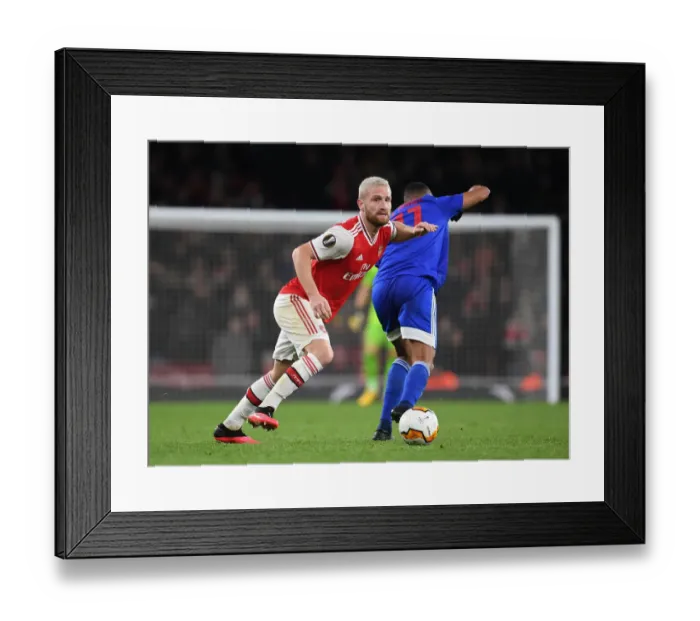Framed Print : Mustafi vs El Arabi: Arsenal vs Olympiacos Europa League Showdown Framed Print : Mustafi vs El Arabi: Arsenal vs Olympiacos Europa League Showdown