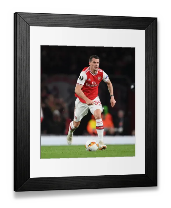 Framed Print : Granit Xhaka in Europa League Action: Arsenal vs. Olympiacos at Emirates Stadium (2019-20) Framed Print : Granit Xhaka in Europa League Action: Arsenal vs. Olympiacos at Emirates Stadium (2019-20)
