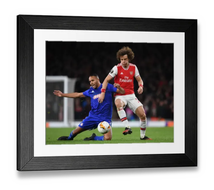 Framed Print : Arsenal vs Olympiacos Showdown: David Luiz vs Youssef El Arabi - Europa League Battle Framed Print : Arsenal vs Olympiacos Showdown: David Luiz vs Youssef El Arabi - Europa League Battle