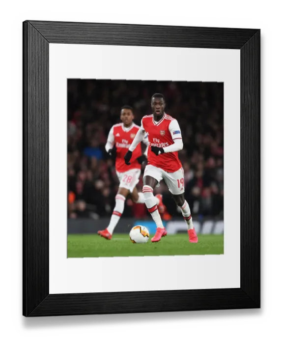 Framed Print : Arsenal's Nicolas Pepe in Action: Arsenal vs Olympiacos, Europa League 2019-2020