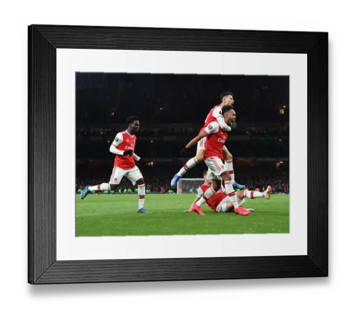 Framed Print : Arsenal's Aubameyang, Saka, and Martinelli Celebrate Goal Against Olympiacos in Europa League