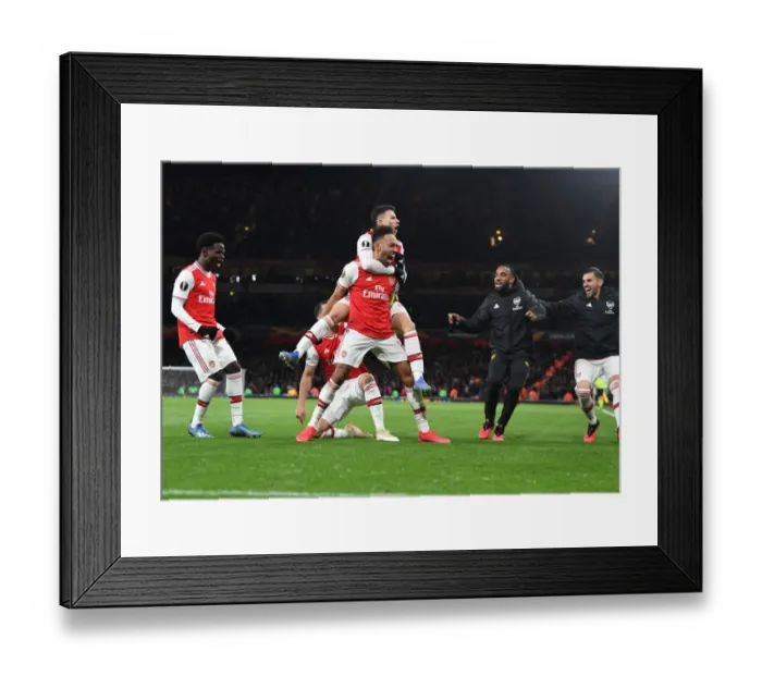 Framed Print : Arsenal's Aubameyang Scores, Celebrates with Team against Olympiacos in Europa League Framed Print : Arsenal's Aubameyang Scores, Celebrates with Team against Olympiacos in Europa League