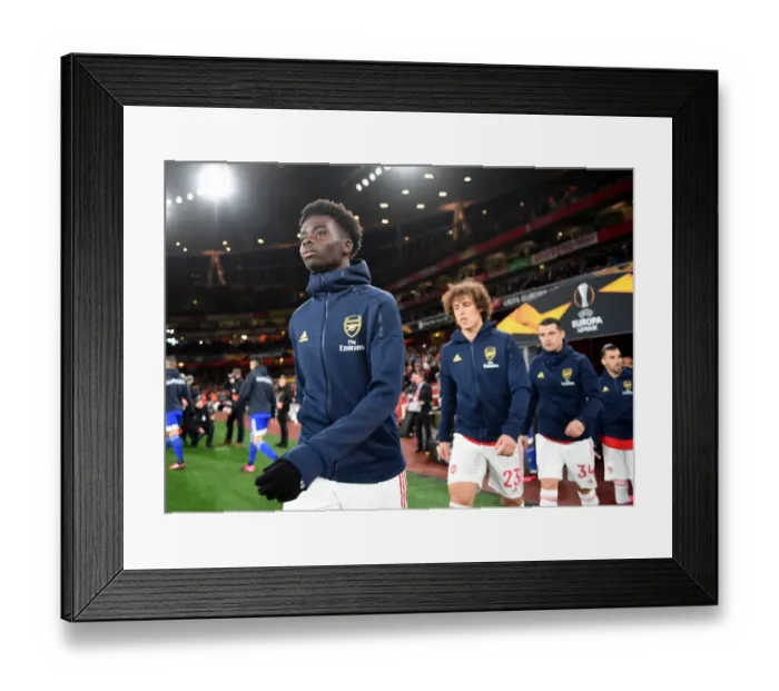 Framed Print : Arsenal's Bukayo Saka Ready for Europa League Showdown Against Olympiacos Framed Print : Arsenal's Bukayo Saka Ready for Europa League Showdown Against Olympiacos