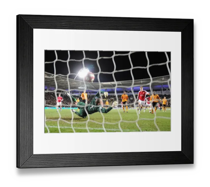 Framed Print : Bendtner's Stunner: Arsenal Takes 2-1 Lead Over Hull City, March 2010