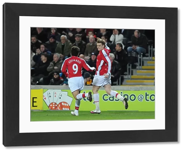 Nicklas Bendtner celebrates scoring the 2nd Arsenal goal with Eduardo. Hull City 1
