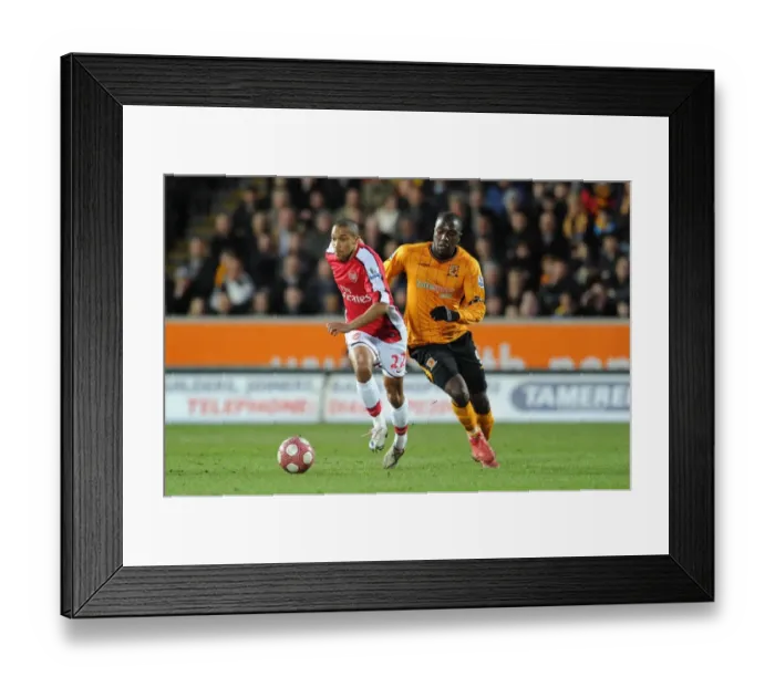 Framed Print : Gael Clichy (Arsenal) Jose Altidore (Hull). Hull City 1: 2 Arsenal, Barclays Premier League
