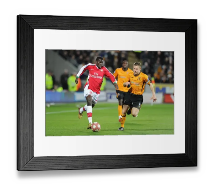 Framed Print : Emmanuel Eboue (Arsenal) Andy Dawson (Hull). Hull City 1: 2 Arsenal, Barclays Premier League