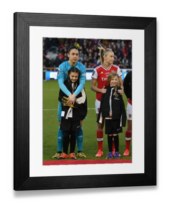 Framed Print : Arsenal Women vs Chelsea Women: Continental League Cup Final - Manuela Zinsberger and Leah Williamson Brace Against the Cold