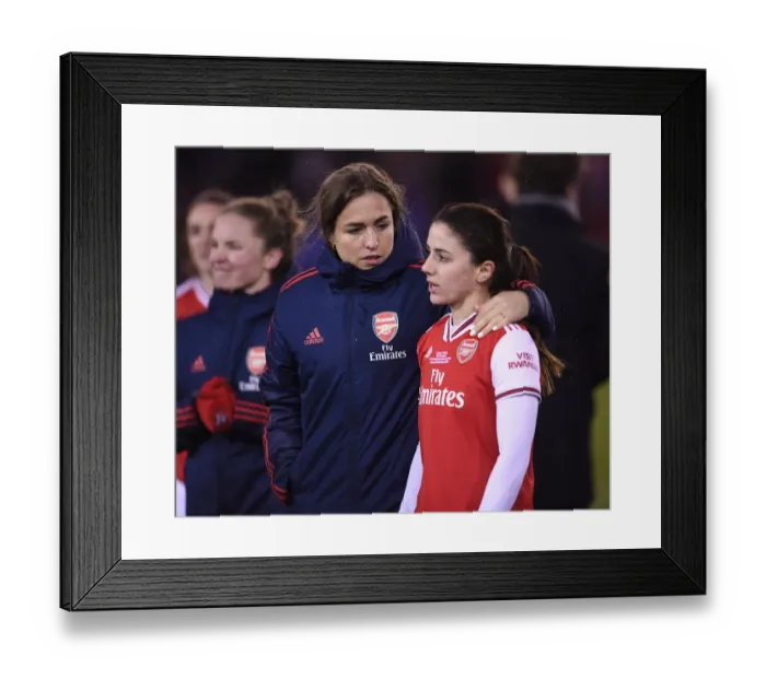 Framed Print : Arsenal Women's Heartbreak: Lia Walti Consoles Van de Donk after FA Womens Continental League Cup Final Loss to Chelsea Framed Print : Arsenal Women's Heartbreak: Lia Walti Consoles Van de Donk after FA Womens Continental League Cup Final Loss to Chelsea