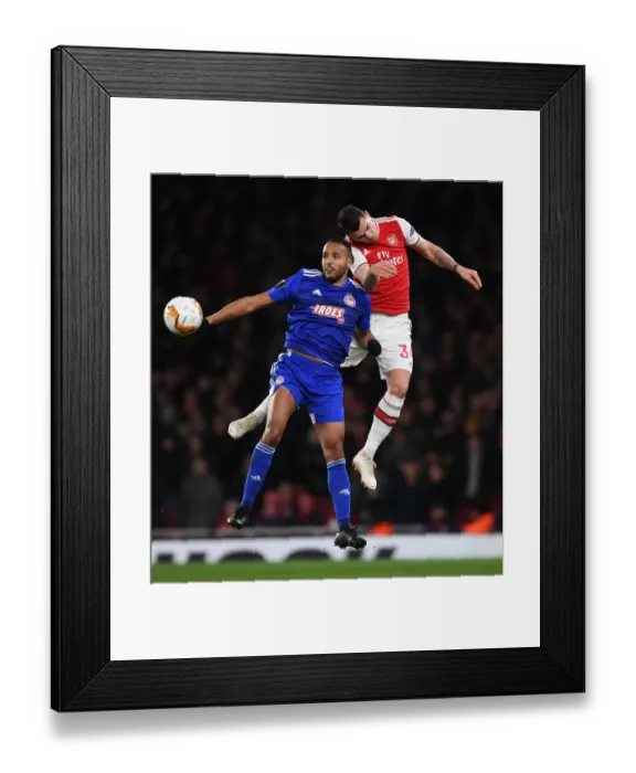 Framed Print : Arsenal vs Olympiacos: Granit Xhaka Heads Under Pressure in Europa League Clash