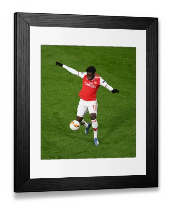 Framed Print : Bukayo Saka in Action: Arsenal's Star Performance against Olympiacos, Europa League 2020 Framed Print : Bukayo Saka in Action: Arsenal's Star Performance against Olympiacos, Europa League 2020