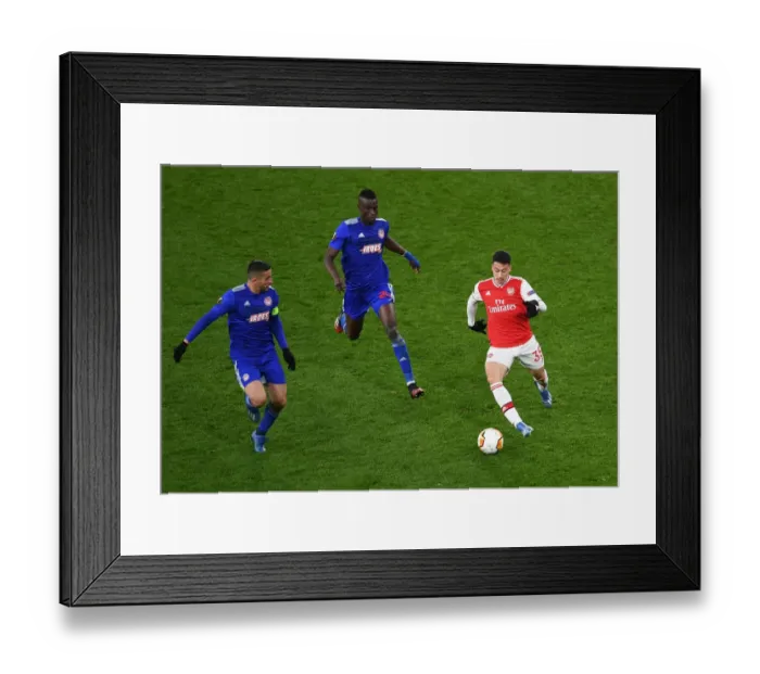 Framed Print : Arsenal vs Olympiacos: Martinelli Clashes with Defenders in Europa League Showdown Framed Print : Arsenal vs Olympiacos: Martinelli Clashes with Defenders in Europa League Showdown