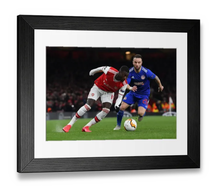 Framed Print : Pepe vs. Vilbuena: Clash in the Europa League between Arsenal and Olympiacos