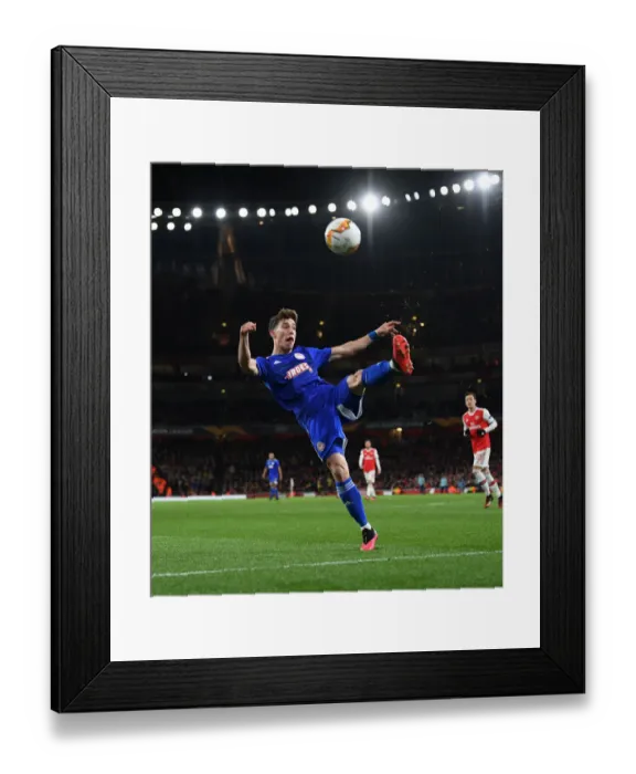 Framed Print : Arsenal FC vs Olympiacos FC: Kostas Tsimikas in Action - UEFA Europa League 2019-20 Round of 32, Second Leg