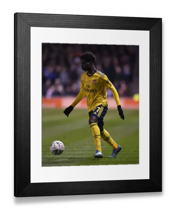 Framed Print : Arsenal's Bukayo Saka in Action against Portsmouth in FA Cup Fifth Round Framed Print : Arsenal's Bukayo Saka in Action against Portsmouth in FA Cup Fifth Round