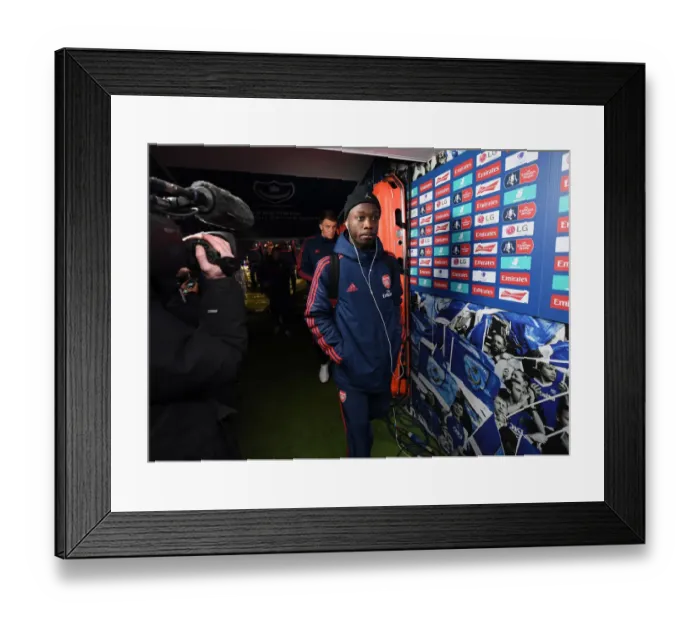 Framed Print : Arsenal's Nicolas Pepe Prepares for FA Cup Fifth Round Clash Against Portsmouth