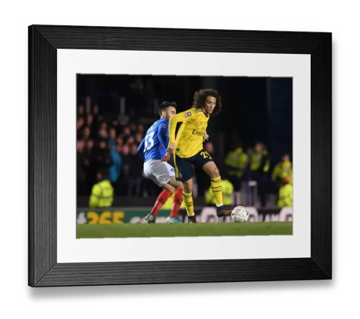 Framed Print : Arsenal's Guendouzi Clashes with Portsmouth's Close in FA Cup Fifth Round Framed Print : Arsenal's Guendouzi Clashes with Portsmouth's Close in FA Cup Fifth Round
