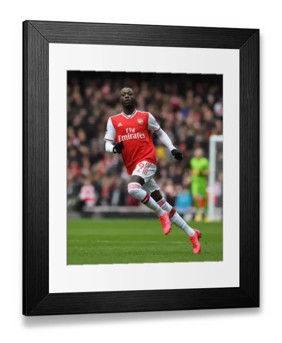 Framed Print : Arsenal's Nicolas Pepe in Action: Premier League 2019-2020 - Arsenal vs. West Ham United Framed Print : Arsenal's Nicolas Pepe in Action: Premier League 2019-2020 - Arsenal vs. West Ham United