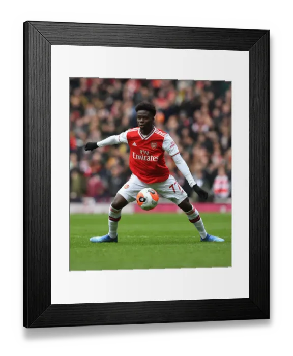 Framed Print : Arsenal's Bukayo Saka in Action: Arsenal vs. West Ham United, Premier League 2019-2020 Framed Print : Arsenal's Bukayo Saka in Action: Arsenal vs. West Ham United, Premier League 2019-2020