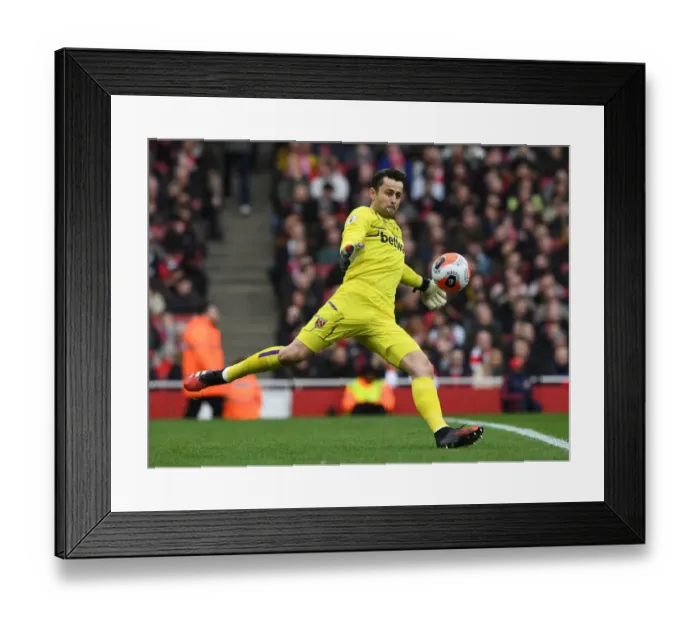 Framed Print : Determined Lukasz Fabianski Faces Off Against Former Team: Arsenal vs. West Ham