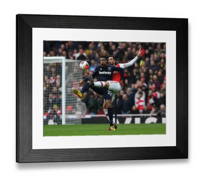 Framed Print : Arsenal vs. West Ham: Pablo Mari Faces Off Against Sebastien Haller in Premier League Clash Framed Print : Arsenal vs. West Ham: Pablo Mari Faces Off Against Sebastien Haller in Premier League Clash