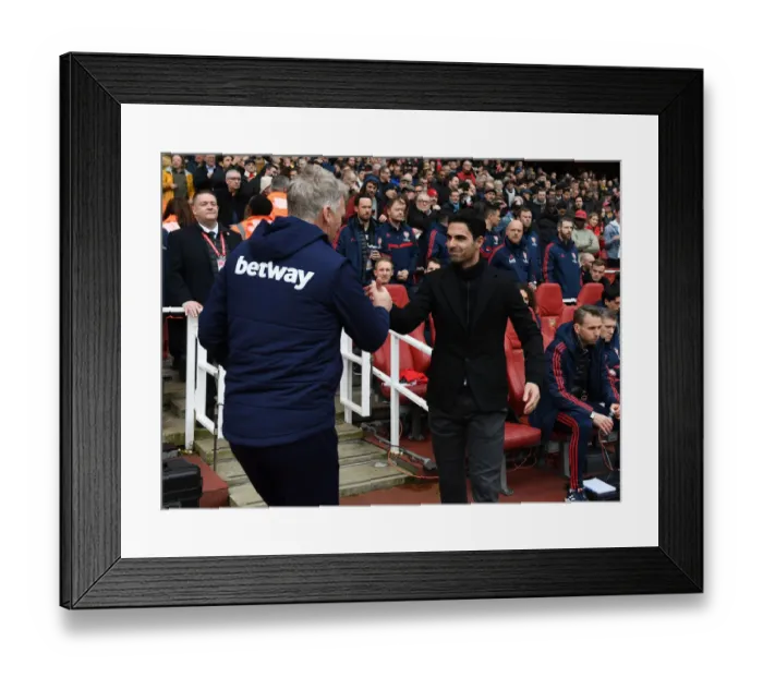 Framed Print : Arsenal's Mikel Arteta and West Ham's David Moyes Pre-Match Handshake - Premier League Showdown at Emirates Stadium Framed Print : Arsenal's Mikel Arteta and West Ham's David Moyes Pre-Match Handshake - Premier League Showdown at Emirates Stadium