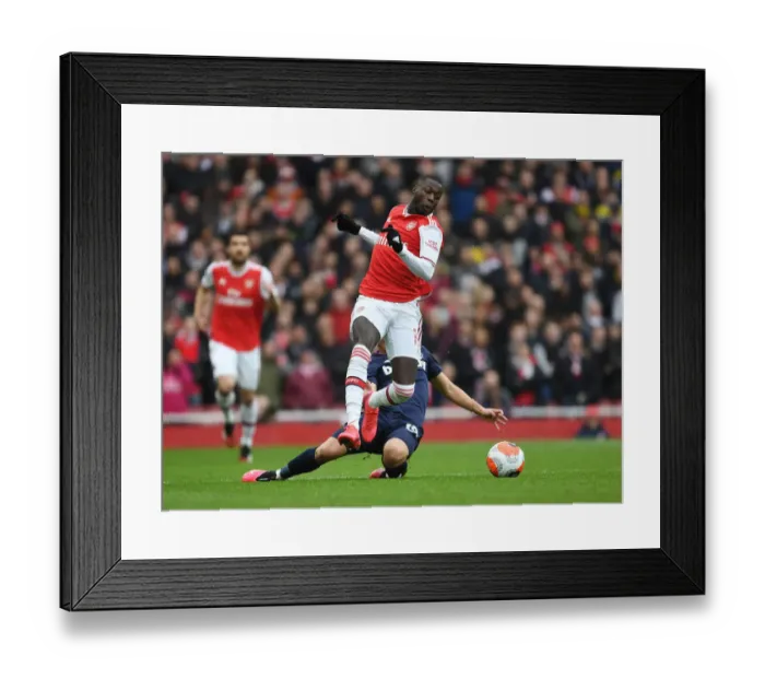 Framed Print : Arsenal vs. West Ham: Pepe vs. Fornals Clash in Premier League Showdown Framed Print : Arsenal vs. West Ham: Pepe vs. Fornals Clash in Premier League Showdown