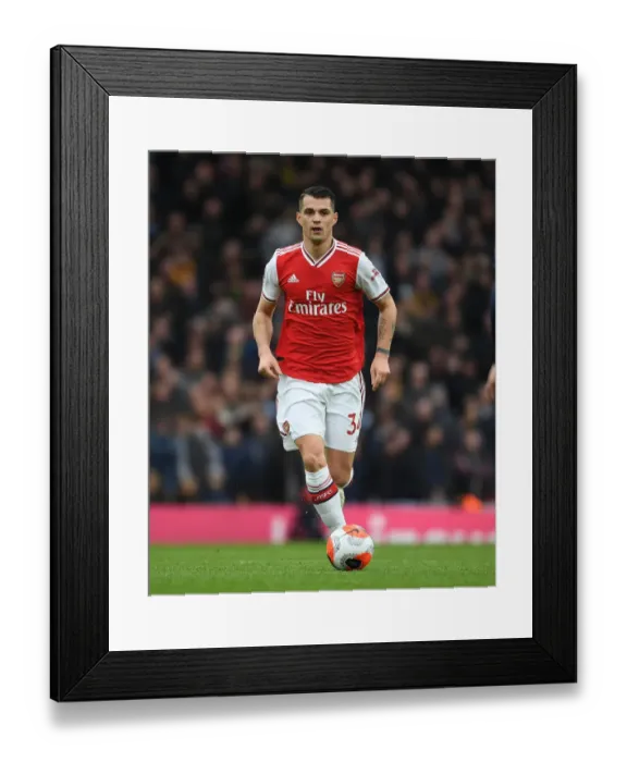 Framed Print : Granit Xhaka in Action: Arsenal vs. West Ham United, Premier League 2019-2020