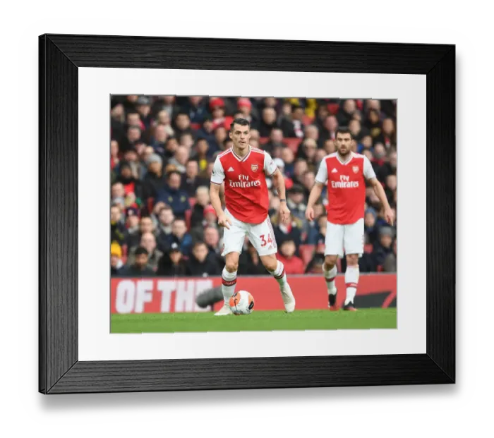 Framed Print : Arsenal vs. West Ham United: Premier League Showdown at Emirates Stadium