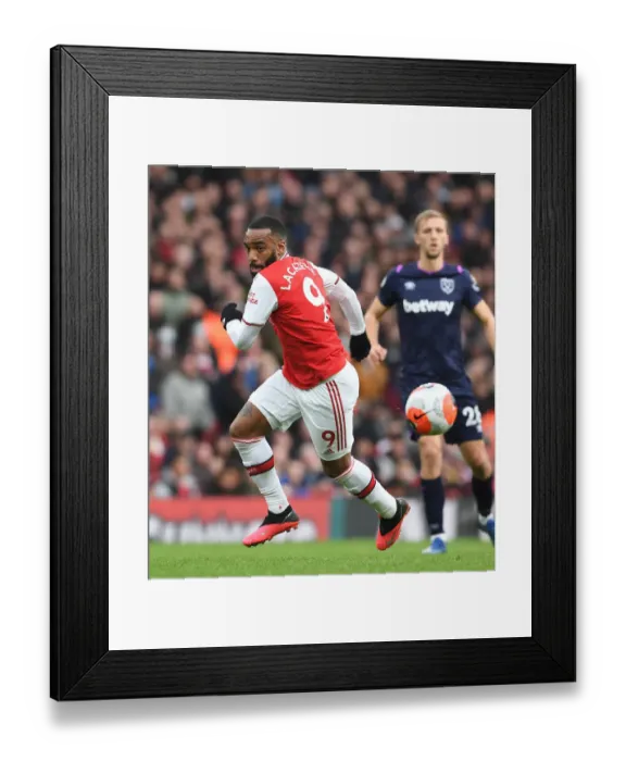 Framed Print : Alexis Lacazette in Action: Arsenal vs. West Ham United, Premier League 2019-2020