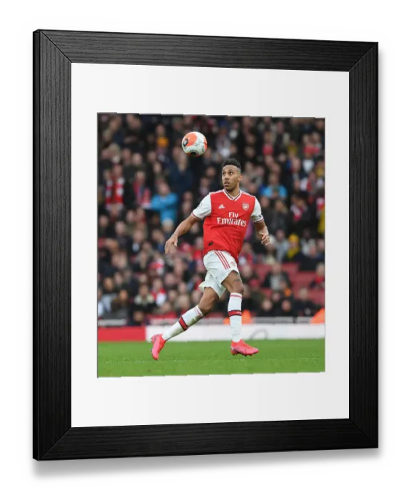 Framed Print : Arsenal's Aubameyang Faces Off in Intense Premier League Showdown Against West Ham