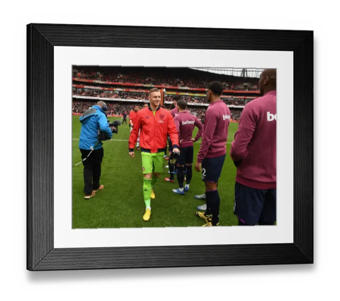 Framed Print : Arsenal vs. West Ham United: Unprecedented Silence as Leno Walks Past the Hammers Ahead of Premier League Clash Amidst Coronavirus Fears Framed Print : Arsenal vs. West Ham United: Unprecedented Silence as Leno Walks Past the Hammers Ahead of Premier League Clash Amidst Coronavirus Fears