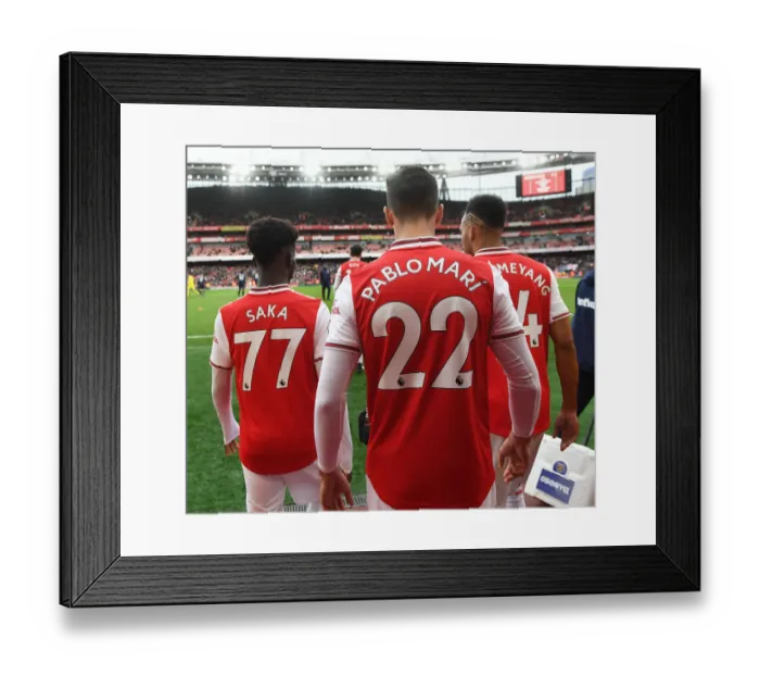 Framed Print : Arsenal's Big Three: Saka, Mari, Aubameyang Lead the Way in Arsenal v West Ham United (2019-20)