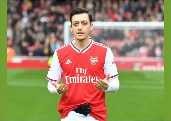 Arsenal's Mesut Ozil in Prayer Before Arsenal v West Ham Premier League Match