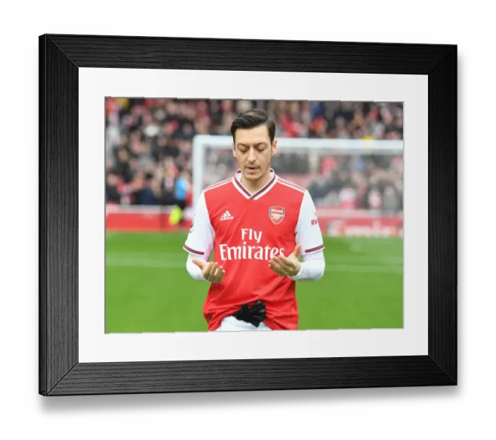 Framed Print : Mesut Ozil in Prayer: Arsenal Football Club's Pre-Match Focus before Arsenal vs West Ham Framed Print : Mesut Ozil in Prayer: Arsenal Football Club's Pre-Match Focus before Arsenal vs West Ham