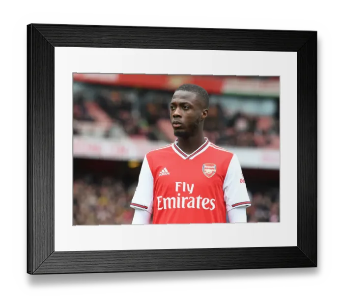 Framed Print : Arsenal's Nicolas Pepe Prepares for West Ham Clash in Premier League Showdown