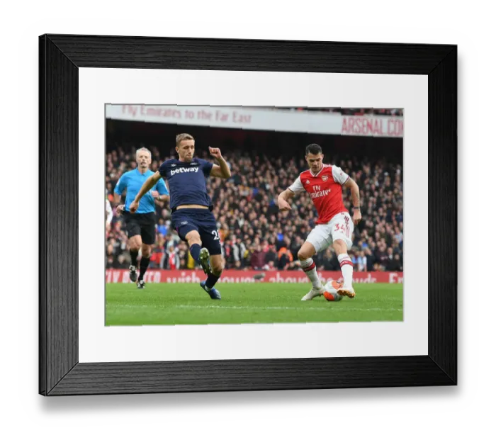 Framed Print : Arsenal vs West Ham United: Premier League Showdown at Emirates Stadium Framed Print : Arsenal vs West Ham United: Premier League Showdown at Emirates Stadium