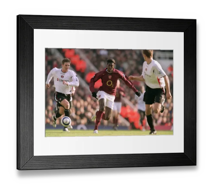 Framed Print : Emmanuel Adebayor (Arsenal) Bryan Hughes (Charlton)