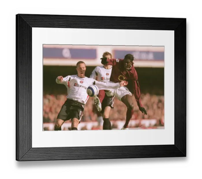 Framed Print : Emmanuel Adebayor (Arsenal) Chris Perry (Charlton) Framed Print : Emmanuel Adebayor (Arsenal) Chris Perry (Charlton)