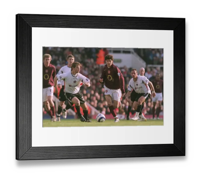 Framed Print : Cesc Fabregas (Arsenal) Jon Spector (Charlton). Arsenal 3: 0 Charlton Athletic