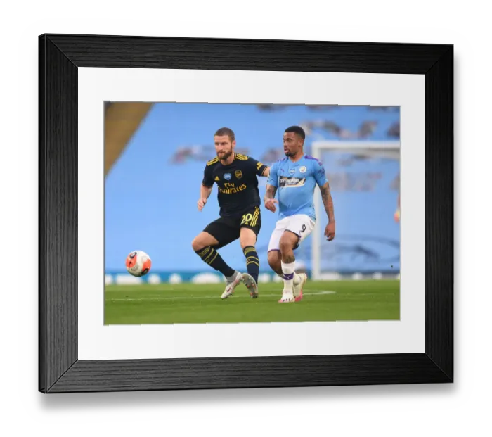 Framed Print : Mustafi Closes In: Manchester City vs. Arsenal FC - Premier League Showdown Framed Print : Mustafi Closes In: Manchester City vs. Arsenal FC - Premier League Showdown