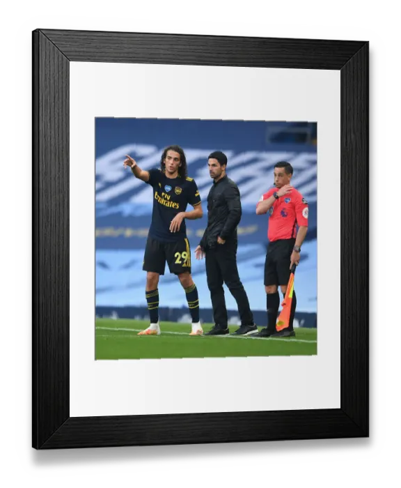 Framed Print : Arsenal's Guendouzi and Arteta in Deep Conversation during Manchester City Clash (2019-20) Framed Print : Arsenal's Guendouzi and Arteta in Deep Conversation during Manchester City Clash (2019-20)