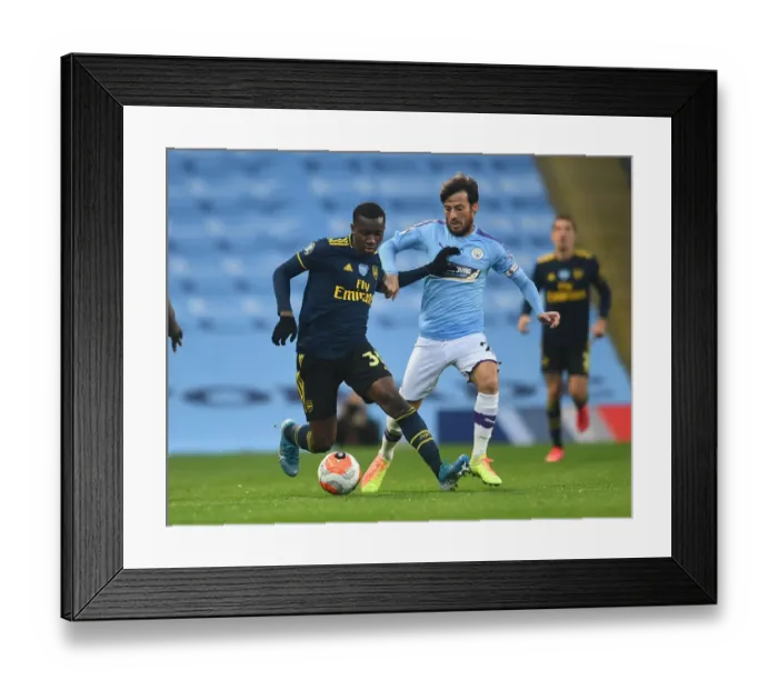 Framed Print : Clash of Titans: Eddie Nketiah vs. David Silva - Manchester City vs. Arsenal FC, Premier League 2019-2020 Framed Print : Clash of Titans: Eddie Nketiah vs. David Silva - Manchester City vs. Arsenal FC, Premier League 2019-2020