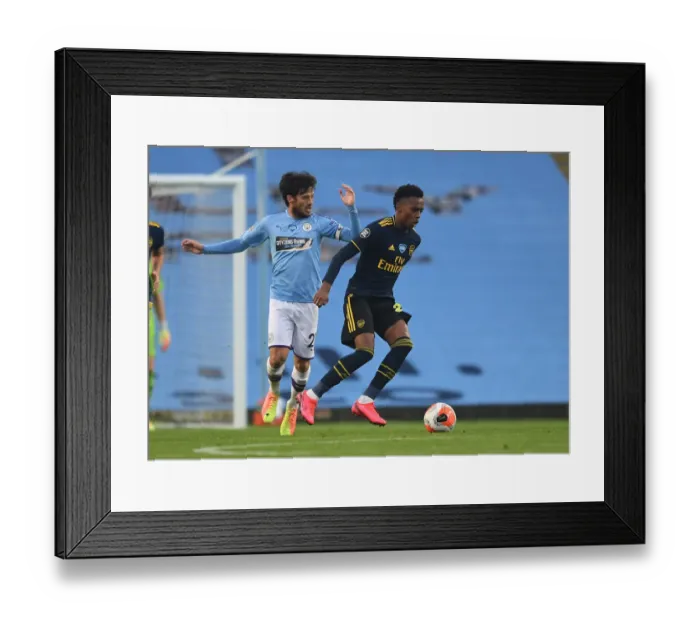 Framed Print : Clash of Titans: Joe Willock vs. David Silva - Manchester City vs. Arsenal FC, Premier League 2019-2020