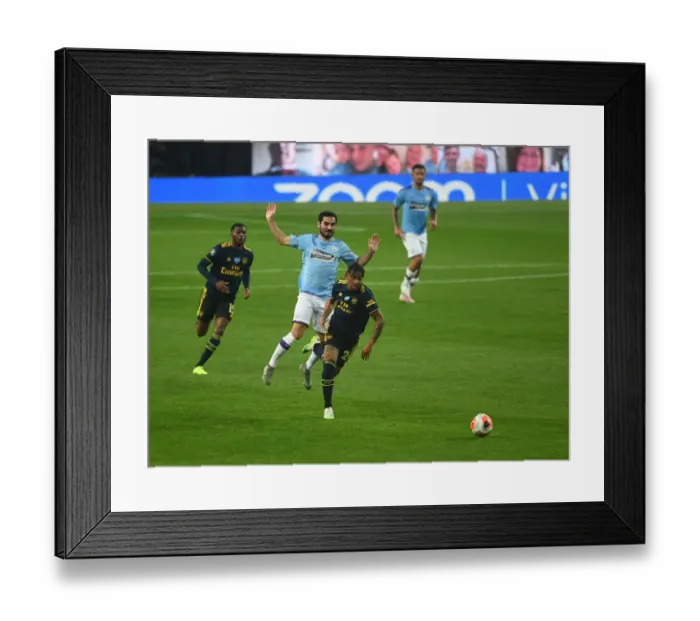 Framed Print : Clash at the Etihad: Reiss Nelson vs. Ilkay Gundogan - Manchester City vs. Arsenal FC, Premier League 2019-2020