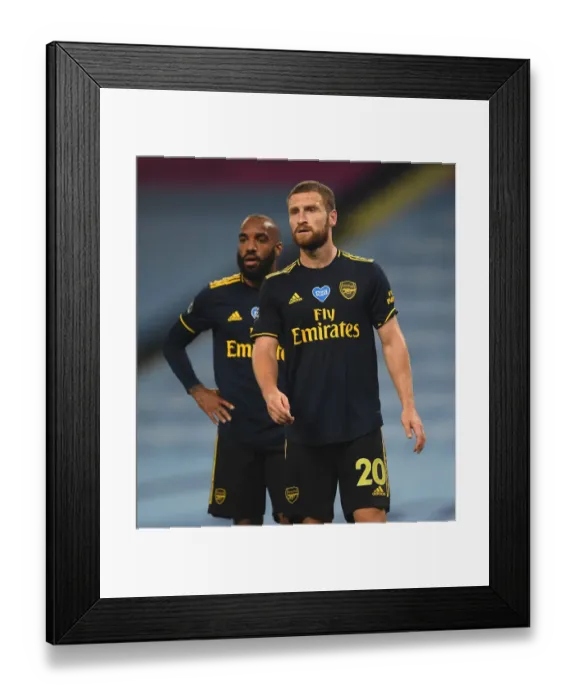 Framed Print : Mustafi Focused: Arsenal vs Manchester City - Premier League Showdown (2019-20)