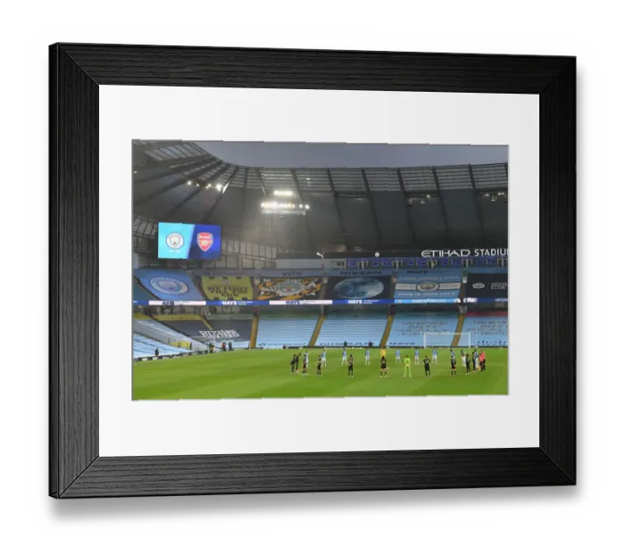 Framed Print : Silence and Determination: Premier League Showdown - Manchester City vs. Arsenal