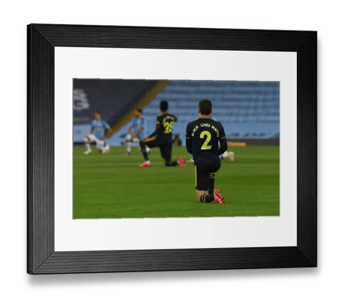 Framed Print : Arsenal's Hector Bellerin Kneels for Black Lives Matter Before Manchester City Match